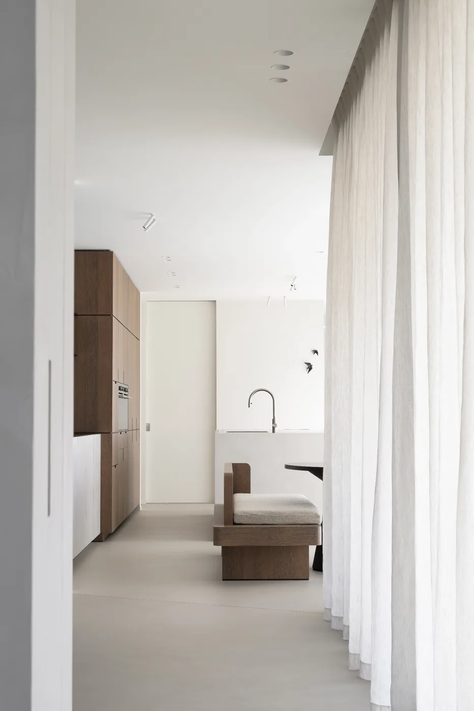 Odilon seamless floor finish in a bright minimal interior